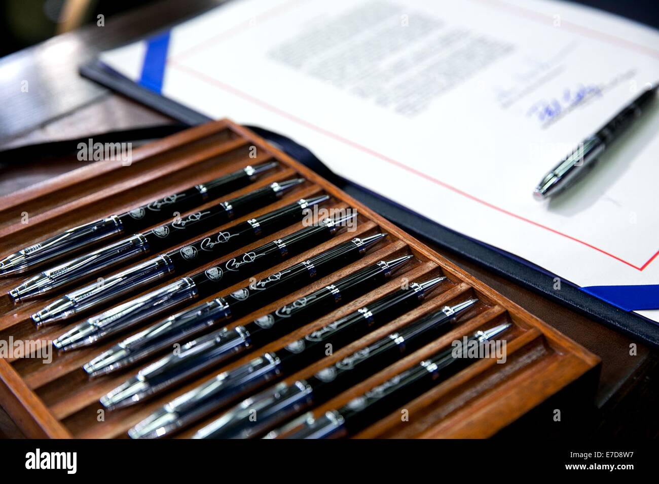 Pens to be used by U.S. President Barack Obama are set on the signing table next to the legislation prior to the signing of H.R. 803, the Workforce Innovation and Opportunity Act, in the Eisenhower Executive Office Building South Court Auditorium July 22, 2014 in Washington, DC. Stock Photo