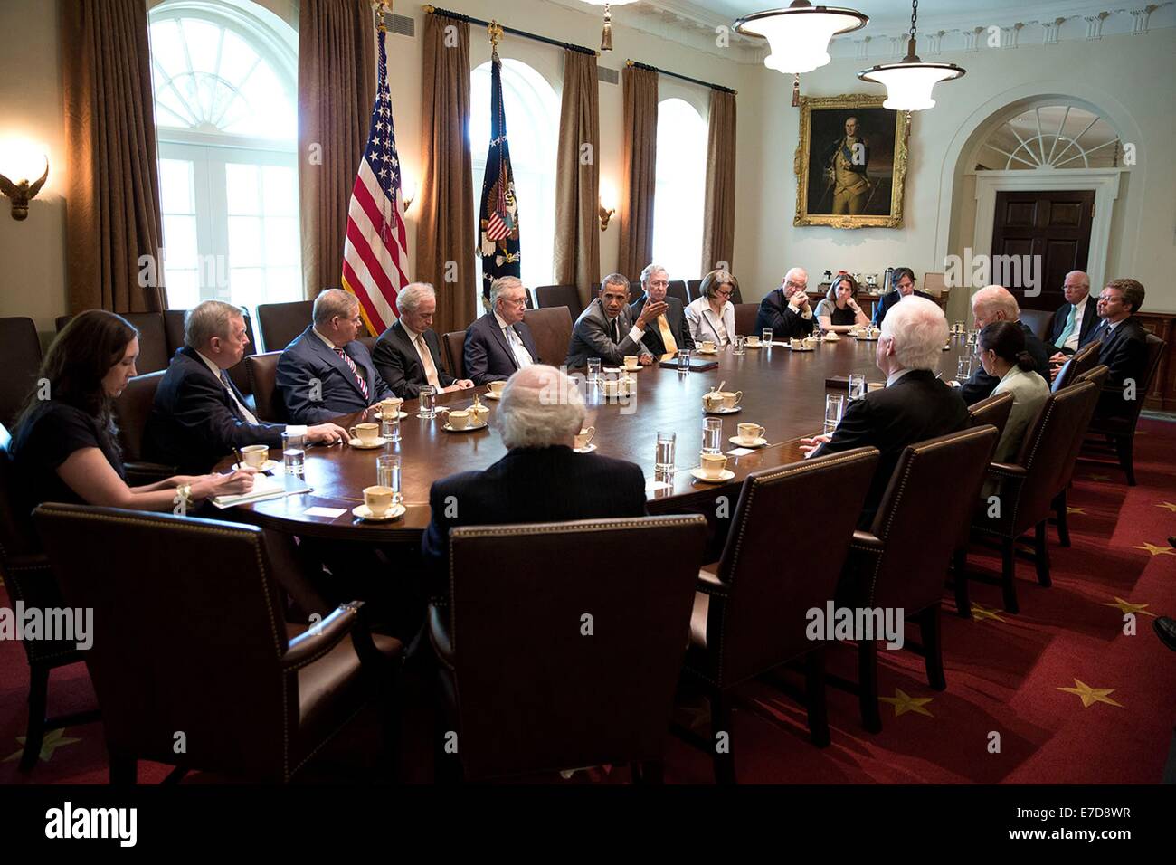 US President Barack Obama and Vice President Joe Biden meet with bicameral congressional leaders to consult with them about ongoing efforts to respond to the conflicts in Ukraine, Iraq, Gaza, Syria, and other issues, in the Cabinet Room of the White House July 31, 2014 in Washington, DC. Stock Photo