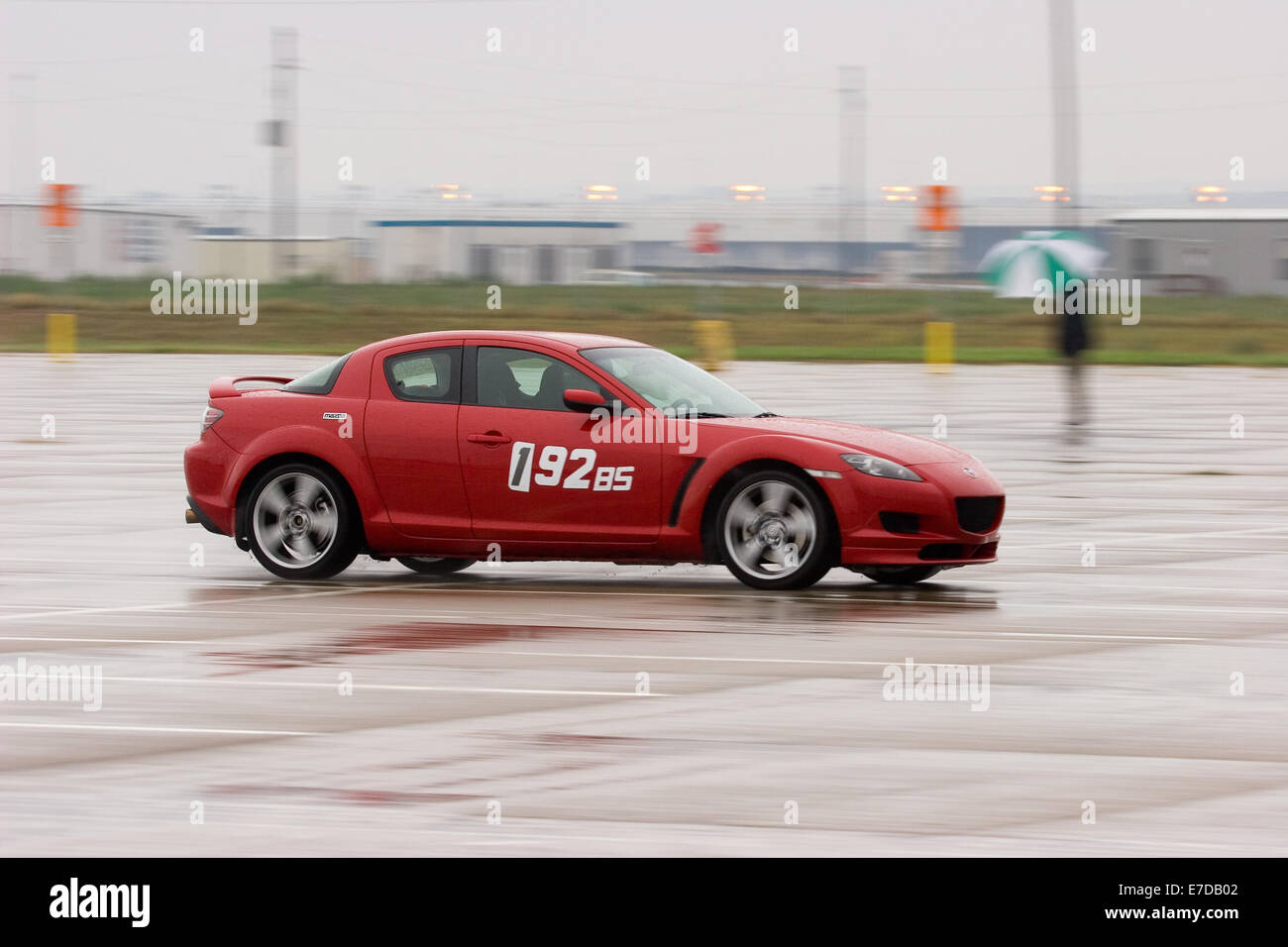 A 2004 Red Mazda RX-8 in an autocross race at a regional Sports Car Club of America (SCCA) event Stock Photo