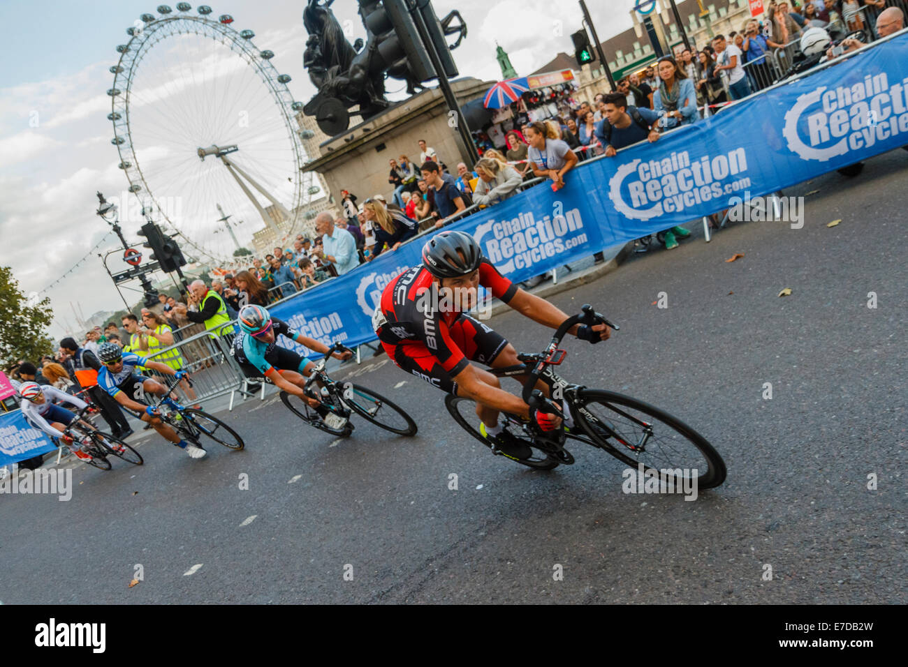 London, UK. 14th September 2014. British rider Stephen Cummings of team BMC leads a breakaway group of riders during the final stage of the Tour of Britain cycle race in central London. Stock Photo