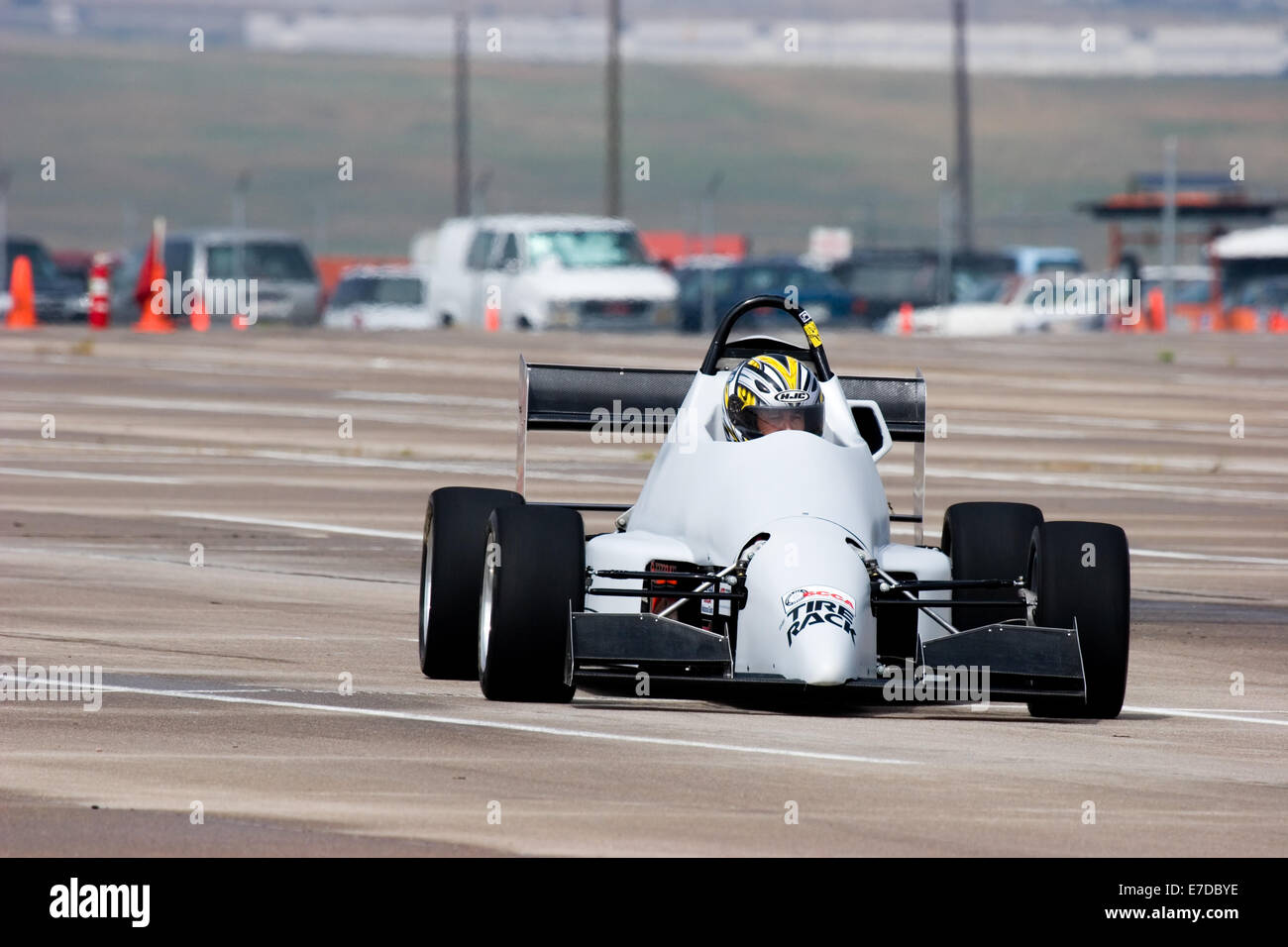 A 2002 Pocket Rocket DC2 gray BModified open wheel race car in an