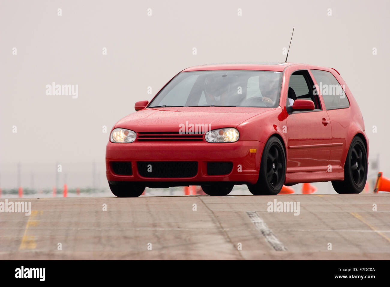 A red sedan in an autocross race at a regional Sports Car Club of America (SCCA) event Stock Photo