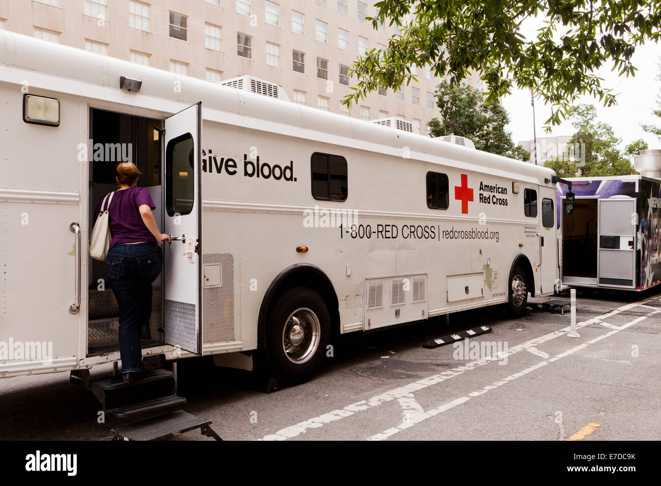 Woman entering Red Cross Mobile Blood Bus - Washington, DC USA Stock Photo