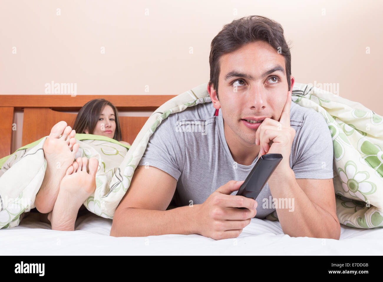 married couple lying in bed Stock Photo Alamy
