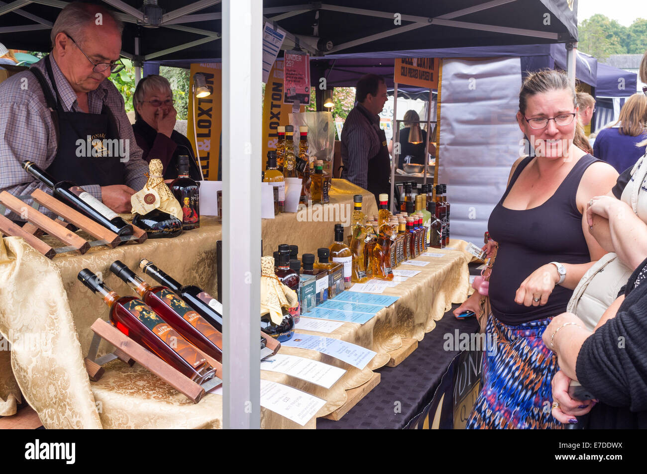 Ashburton Food & Drink Festival market stalls UK.  The Monarc Liqueur stall selling bespoke liqueurs and rare spirits. Stock Photo