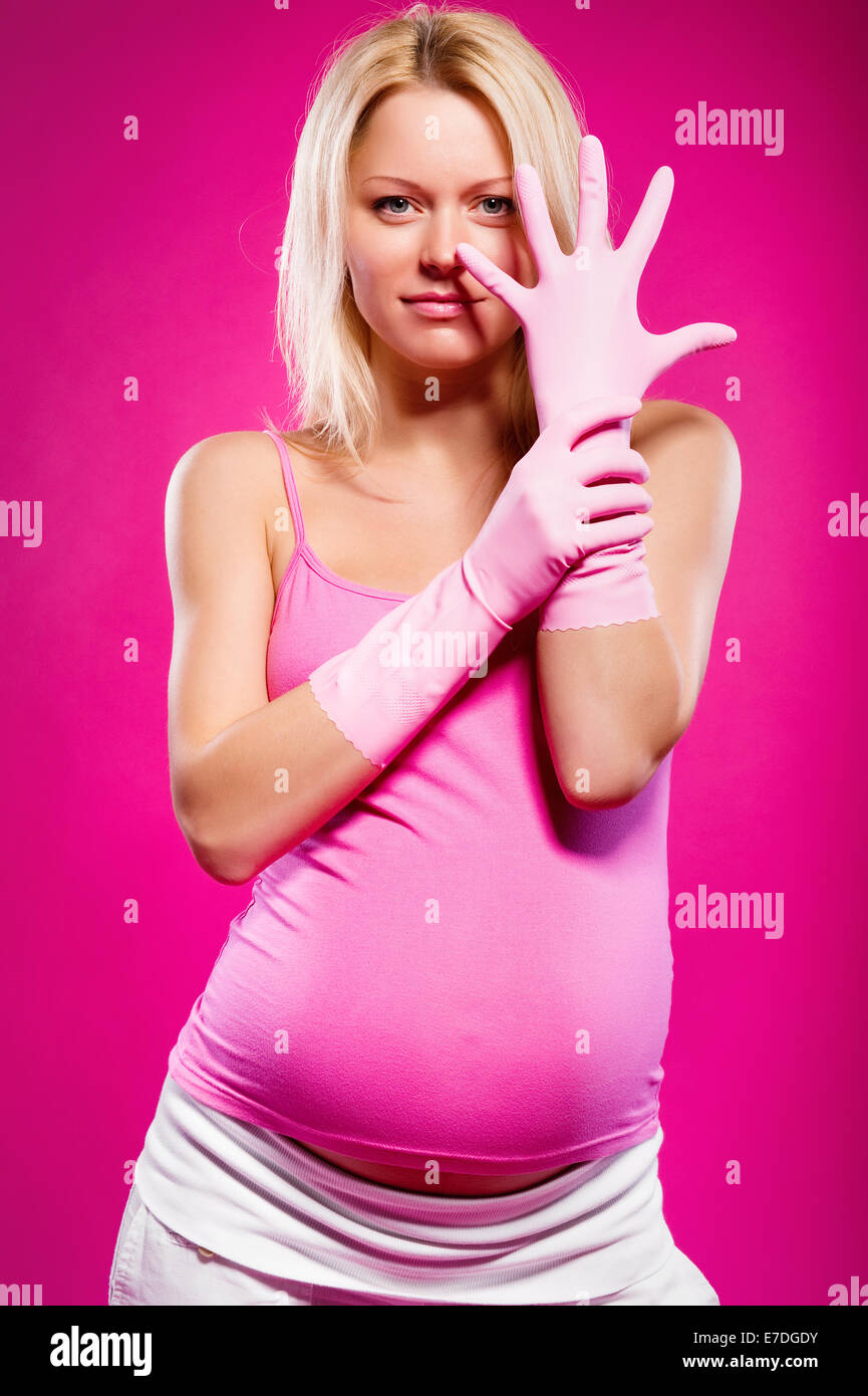 Pregnant woman with rubber gloves Stock Photo Alamy