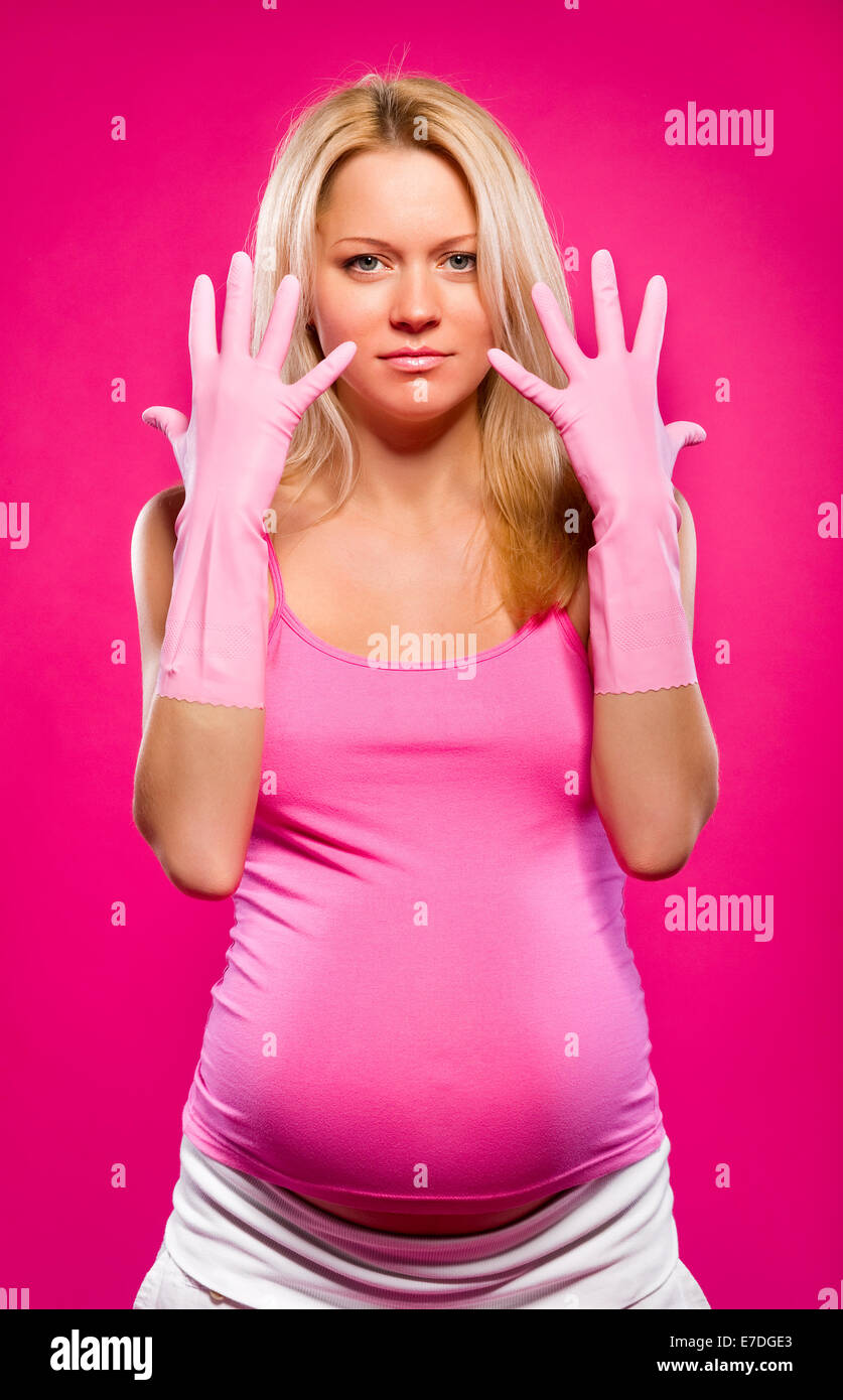 Pregnant woman with rubber gloves Stock Photo Alamy