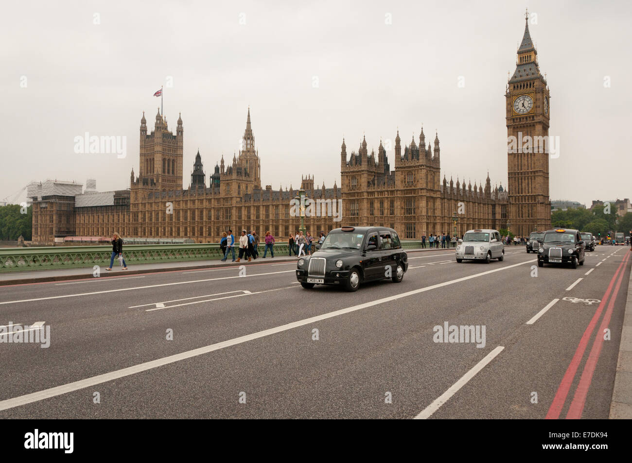 London Taxis on Westminster Bridge under Big Ben Stock Photo - Alamy