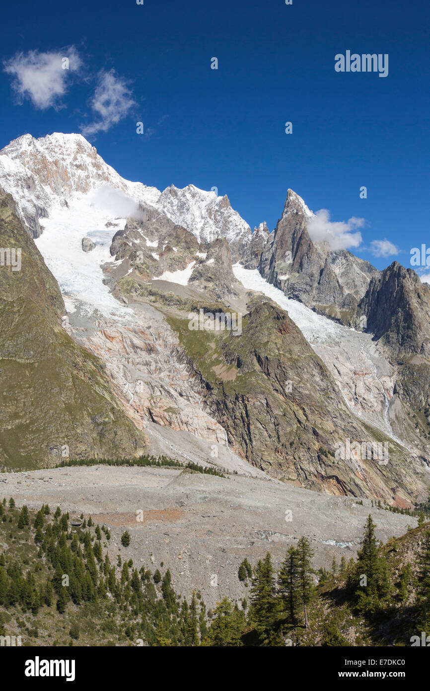 The rapidly retreating Brouillard glacier, and Freney Glacier, on the slopes of Mont Blanc du Courmayeur, the newly exposed rock clearly reveals the area the glacier used to cover. Stock Photo