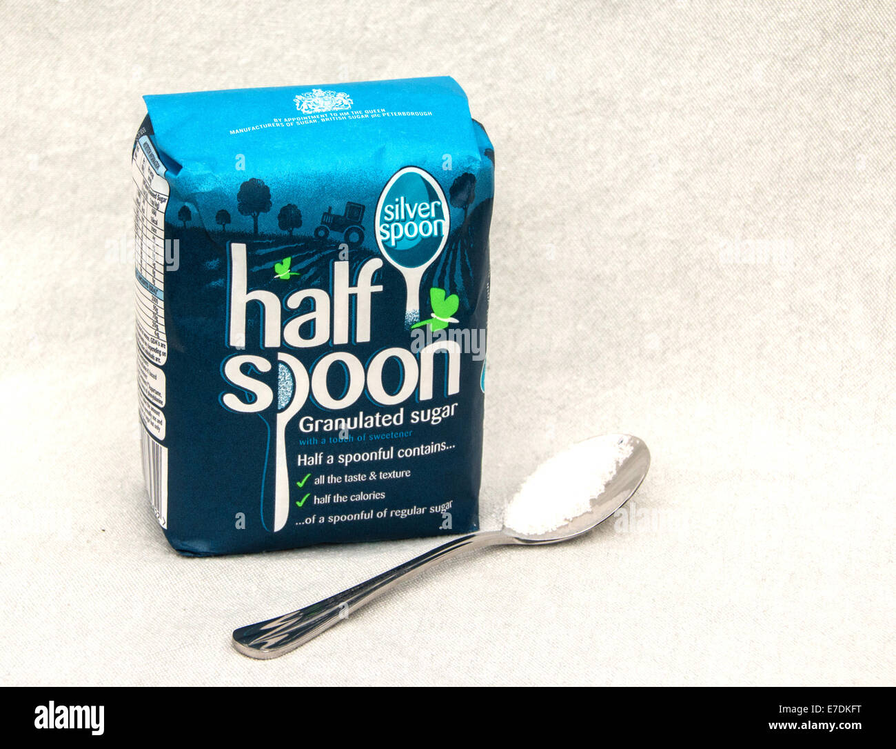 A bag of half spoon sugar with a spoon (Land Stock Photo Alamy