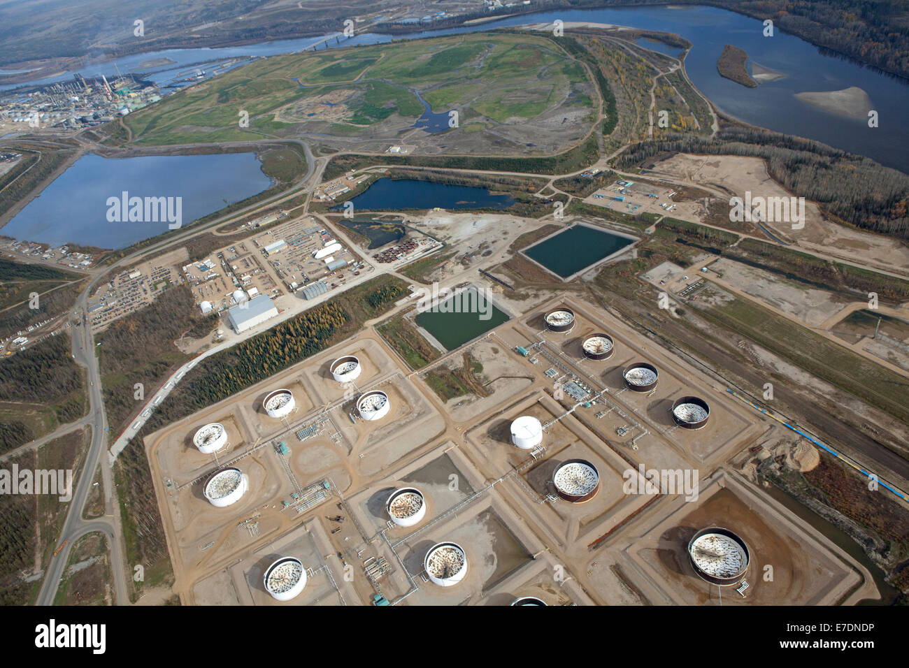 Aerial view of refinery storage tanks at oil sands industrial site, Fort McMurray, Alberta, Canada Stock Photo