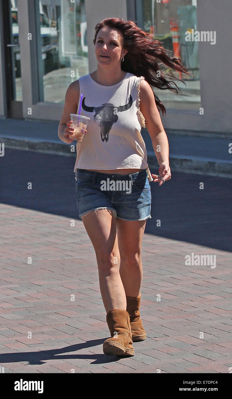 Britney Spears shopping at Planet Blue's flagship store in Malibu. Spears  was spotted wearing cutoff denim shorts, a Texas Longhorns tank top and Ugg  boots. Featuring: Britney Spears Where: Los Angeles, California,