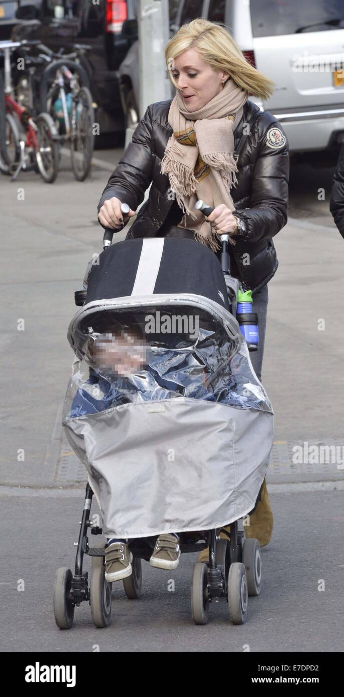 Jane Krakowski pushes her son Bennett in a stroller while out and about