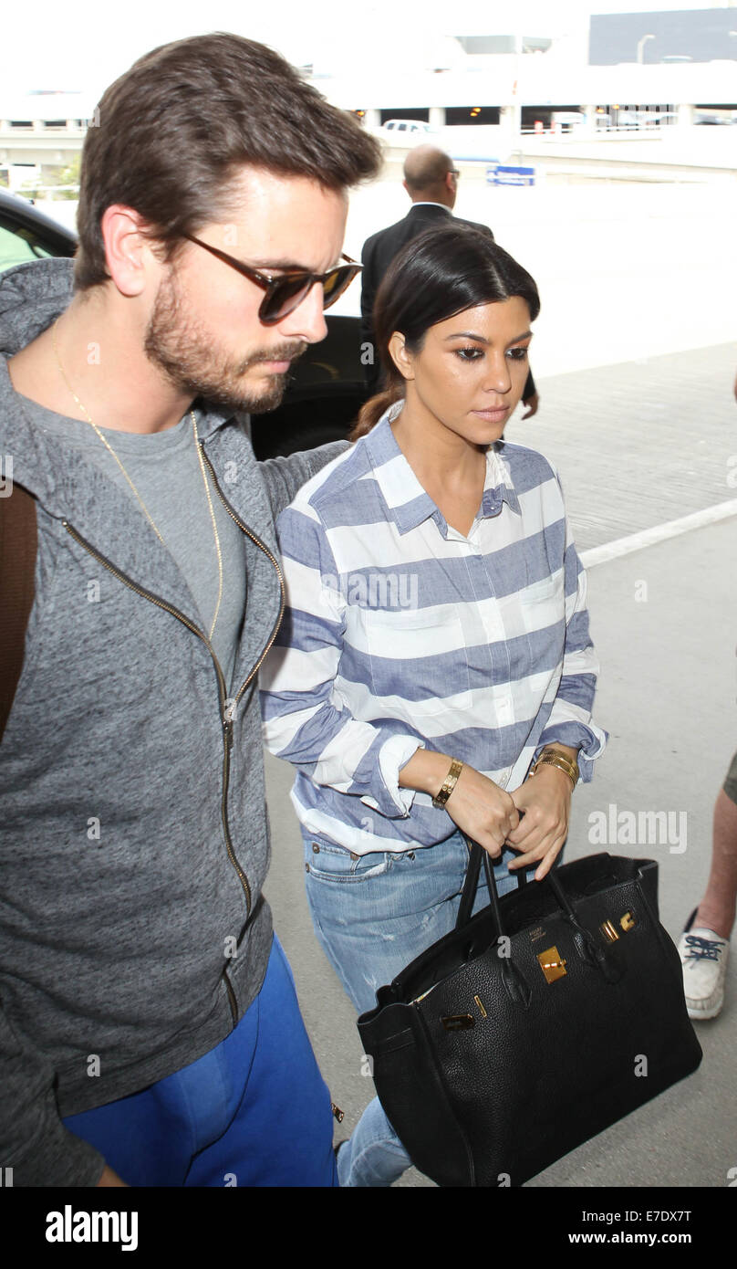 Kim Kardashian, along with sister Kourtney and Scott Disick, arrive at Los  Angeles International Airport (LAX) to catch a flight Featuring: Scott  Disick,Kourtney Kardashian Where: Los Angeles, California, United States  When: 11