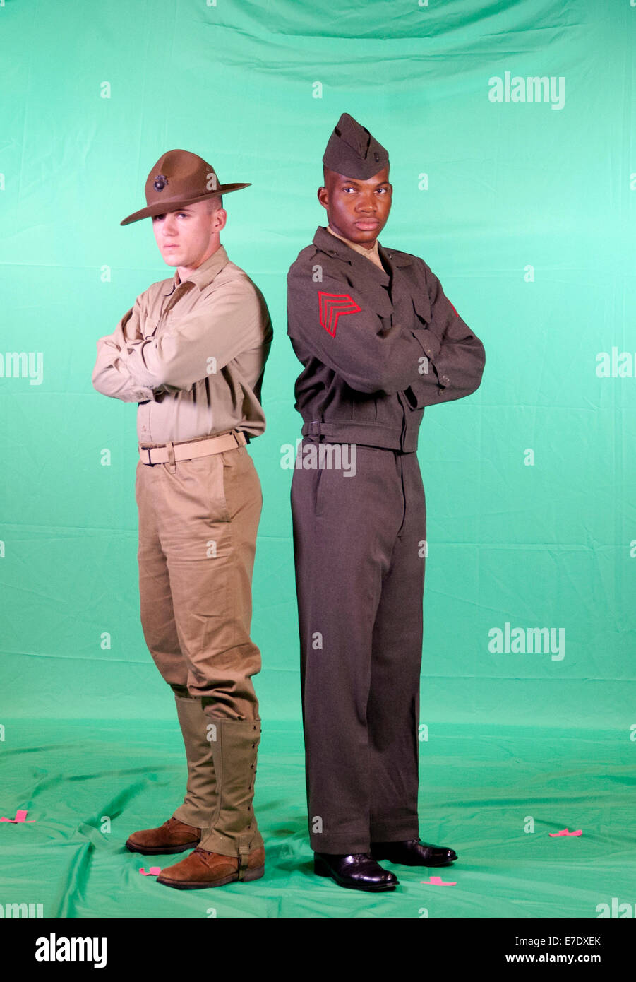 Male US Marines wear the World War I and II uniforms dressed as they participate in the filming of the commandant's birthday message September 3, 2014 in Washington, D.C. Marines were fitted with historic uniforms to simulate the history of the Marine Corps throughout the past 238 years. Stock Photo