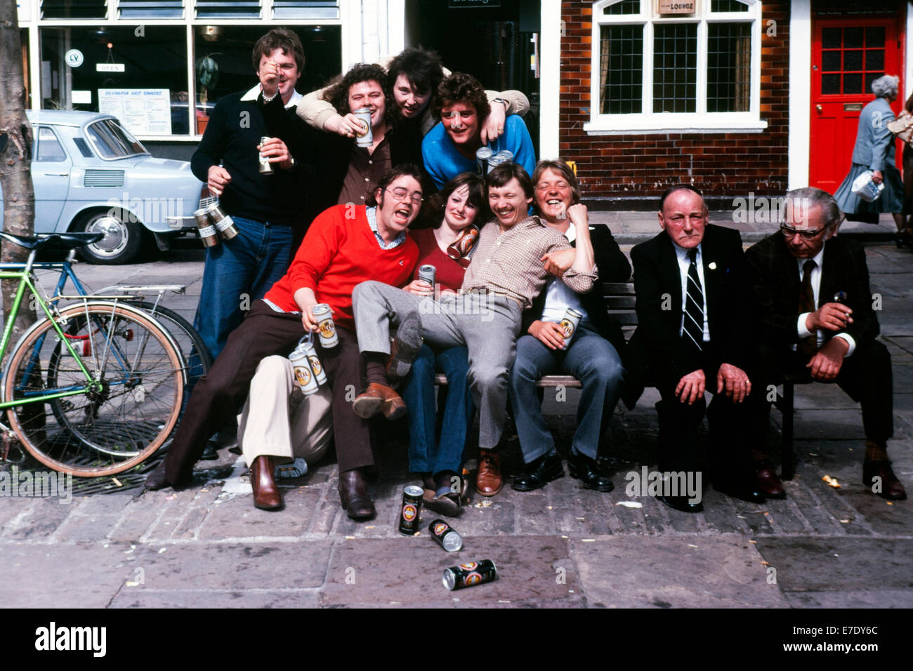 boisterous young people having a good time drinking in york england uk1980 Stock Photo
