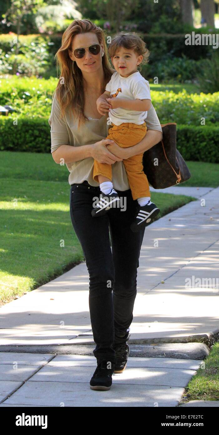 Molly Sims carries her son Brooks in her arms as they go for a car journey  Featuring: Molly Sims,Brooks Stuber Where: Los Angeles, United States When:  12 Mar 2014 Stock Photo - Alamy