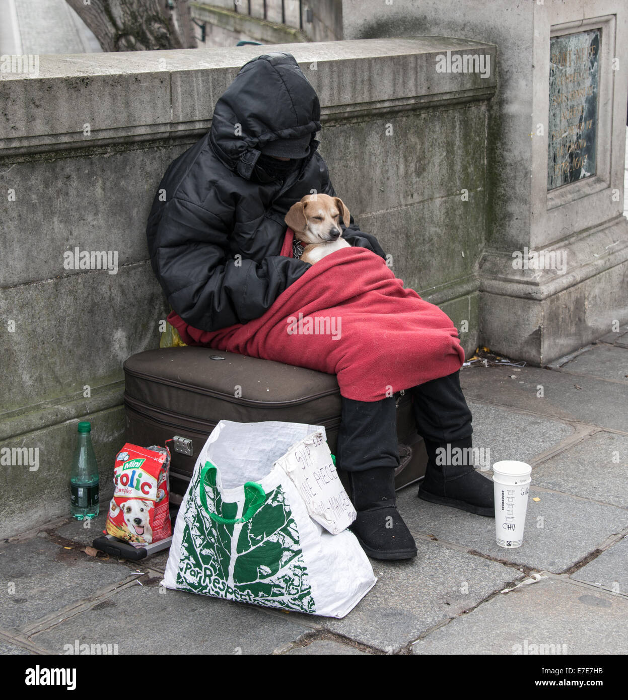 Beggar with dog Stock Photo