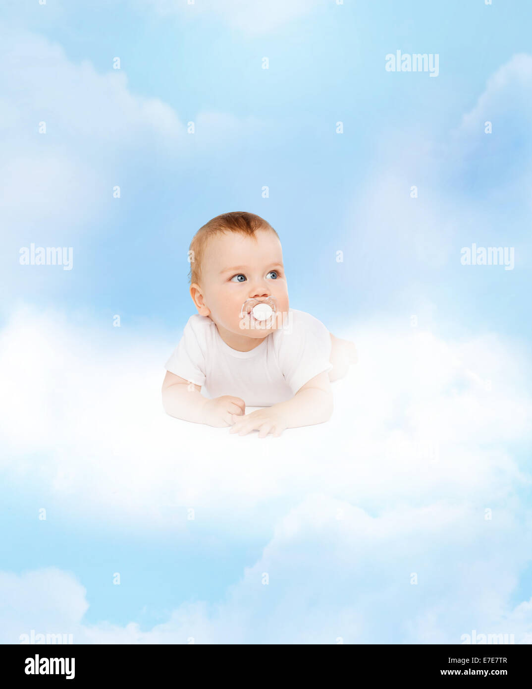 smiling baby lying on cloud with dummy in mouth Stock Photo Alamy
