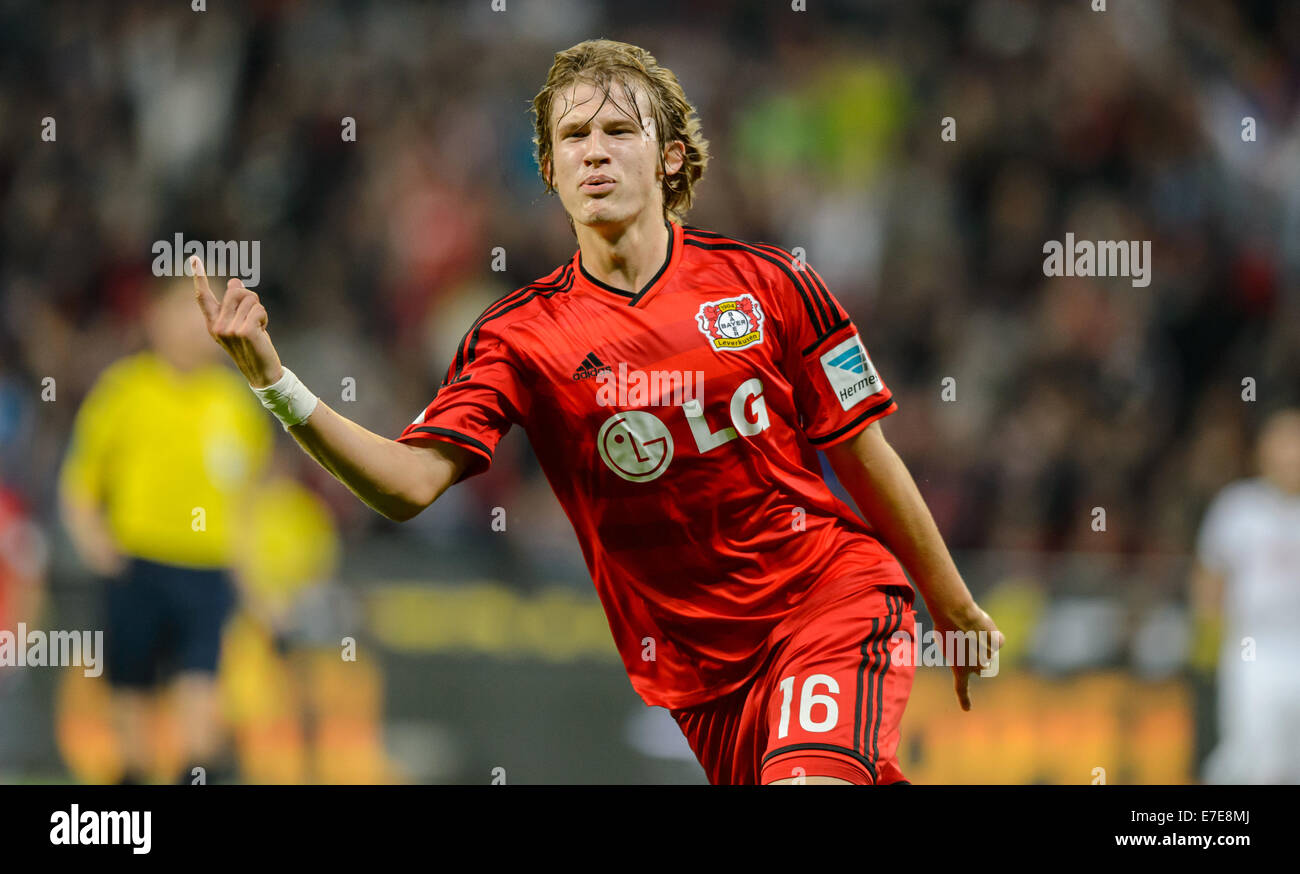 Leverkusen's Tin Jedvaj cheers during the Bundesliga soccer match
