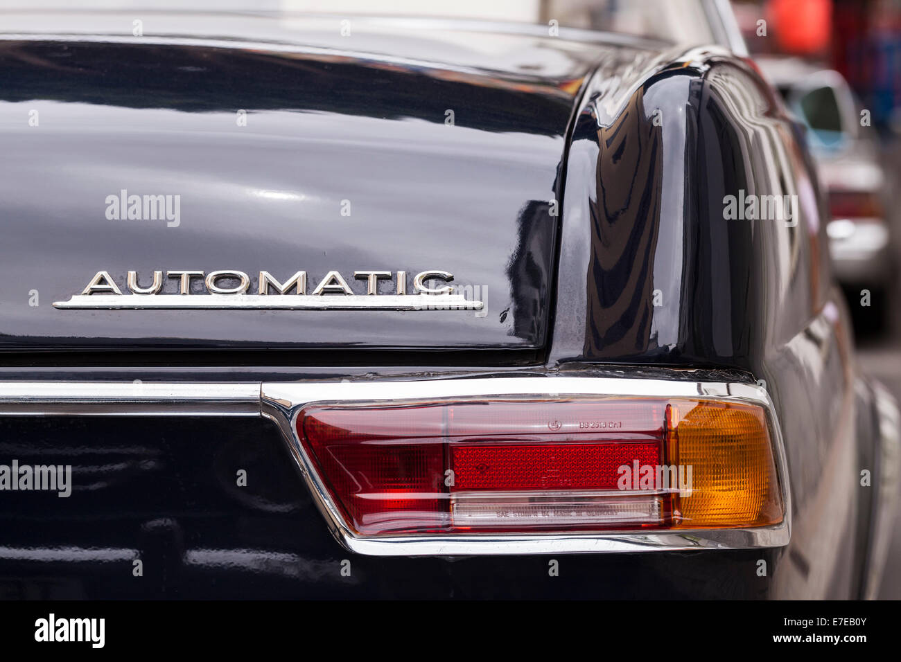 Detail of Automatic badge and rear lights on a vintage Mercedes Benz in Guia de Isora, Tenerife, Canary Islands, Spain. Stock Photo