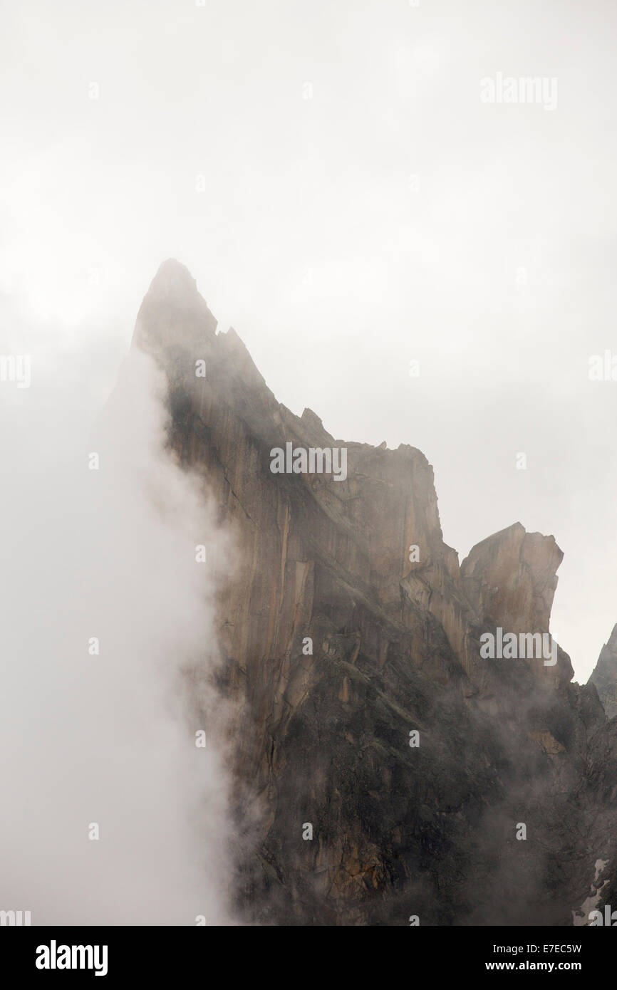 Glimpsing the Glochers du Portalet with miasts swirling from Cabanne D'Orny in the Swiss Alps. Stock Photo
