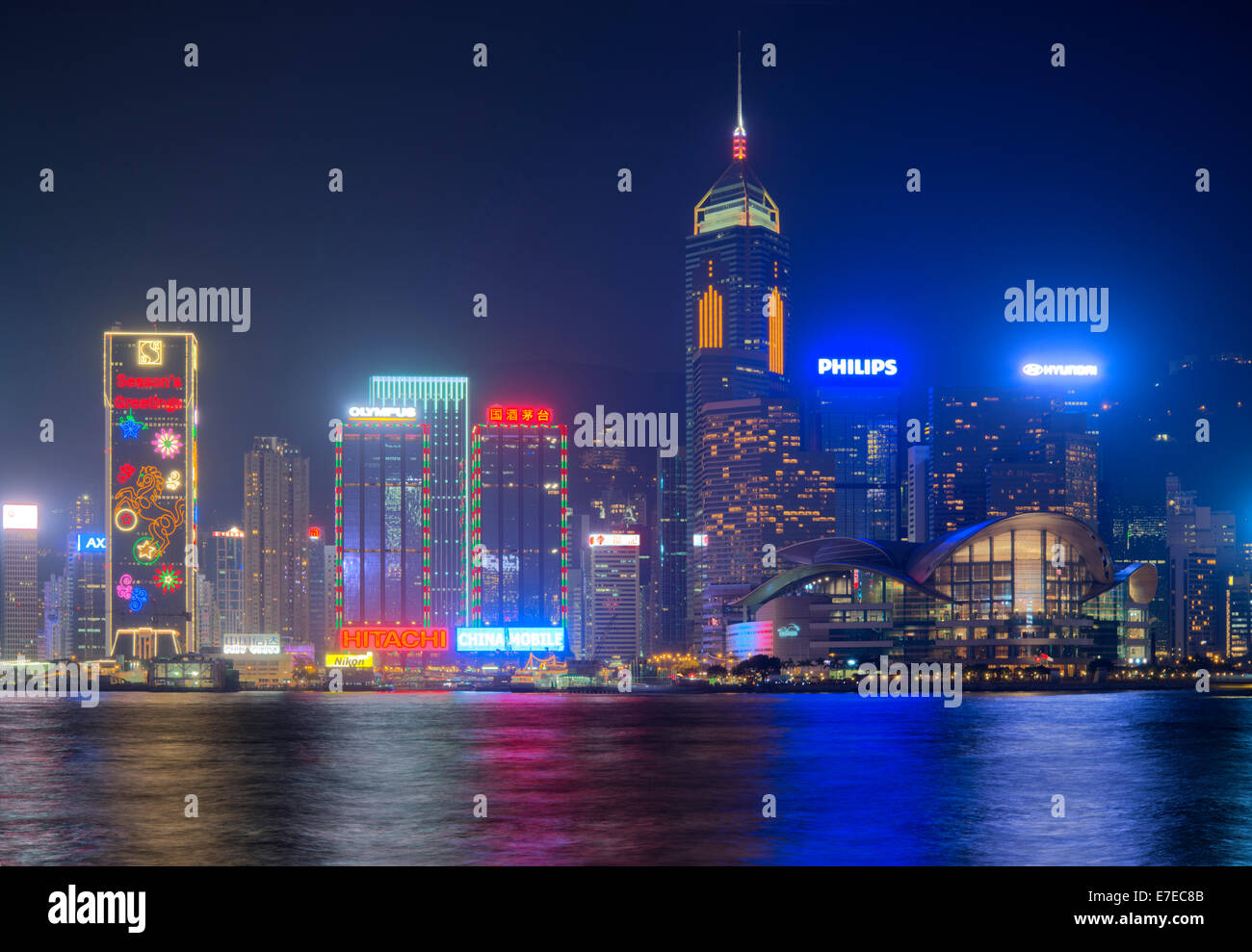 Hong Kong Christmas Decoration and Victoria Harbour at Night Stock Photo