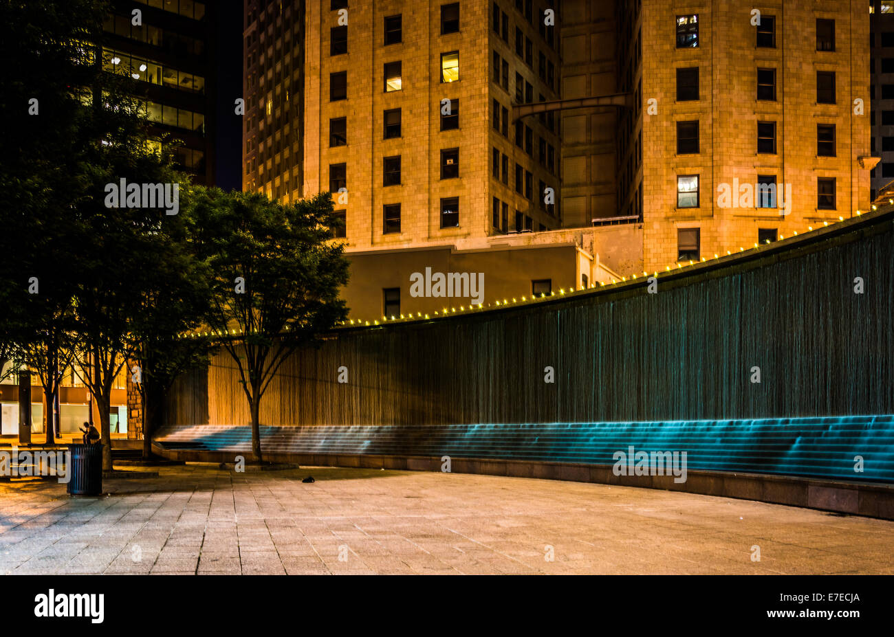 Fountains and buildings at night at Woodruff Park in downtown Atlanta