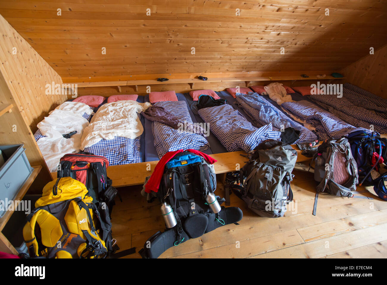 One of the dorm bedrooms in the Cabanne D' Orny in the Swiss Alps, a mountain hut at over 10,000 feet. Stock Photo