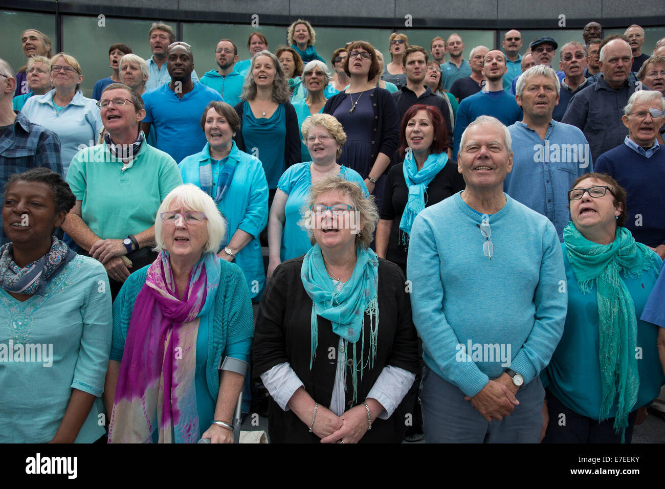 Adults choir, made from choirs from all over the region, perform at The Scoop. Totally Thames Festival, London, UK. Stock Photo