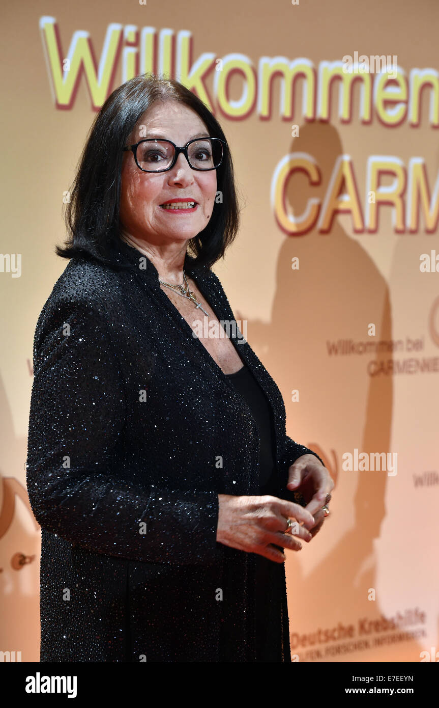 Berlin, Germany. 13th Sep, 2014. Greek singer Nana Mouskouri arrives for the charity television show 'Willkommen bei Carmen Nebel' (Welcome to Carmen Nebel), aired on German public broadcaster ZDF in Berlin, Germany, 13 September 2014. Photo: Jens Kalaene/dpa/Alamy Live News Stock Photo
