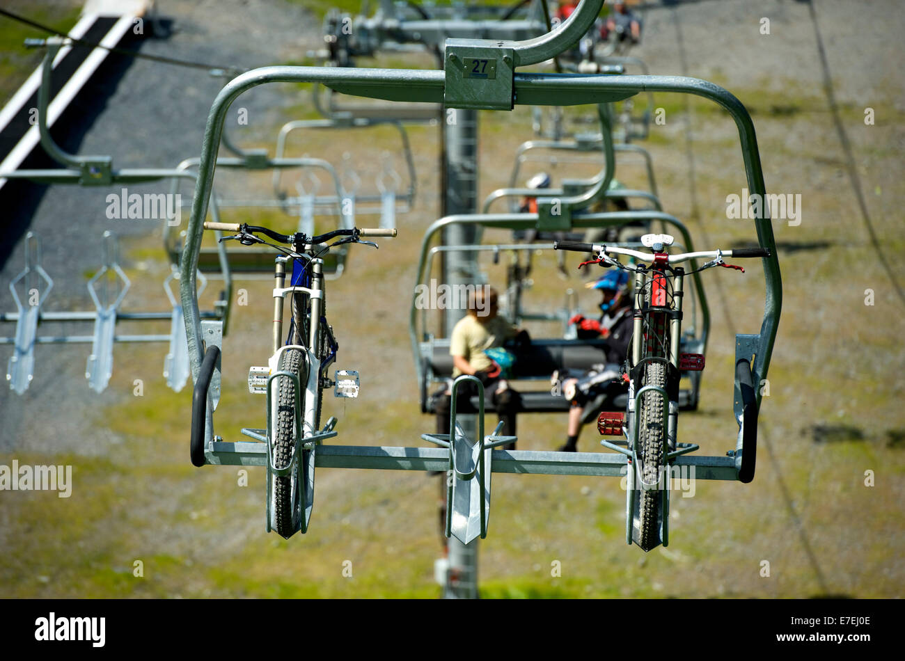 Downhill mountain bike riders during a day of lift service riding at Alyeska Resort in Girdwood, Alaska June 2011. Stock Photo