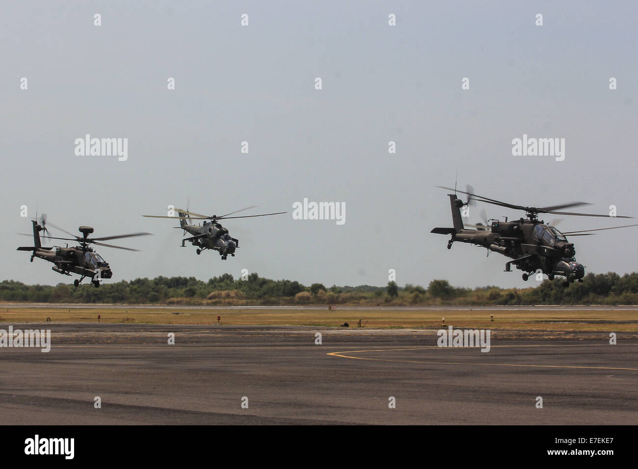 Semarang, Indonesia. 15th Sep, 2014. Military helicopters take part during the 8th Joint Exercise Garuda Shield 2014 at Army Air Base at Ahmad Yani Airport in Semarang, Central Java, Indonesia. Garuda Shield is the password for the joint exercise conducted by the Indonesian Army and the US Army and took place from 01 September to 29 September 2014 in Semarang and Asembagus, Situbondo, Indonesia. Credit:  WF Sihardian /Pacific Press/Alamy Live News Stock Photo