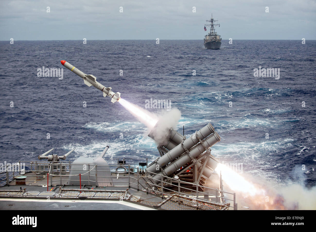 A Harpoon anti-ship missile is launched from the Ticonderoga-class guided-missile cruiser USS Shiloh during exercise Valiant Shield 2014 September 15, 2014 off the coast of Guam. Stock Photo