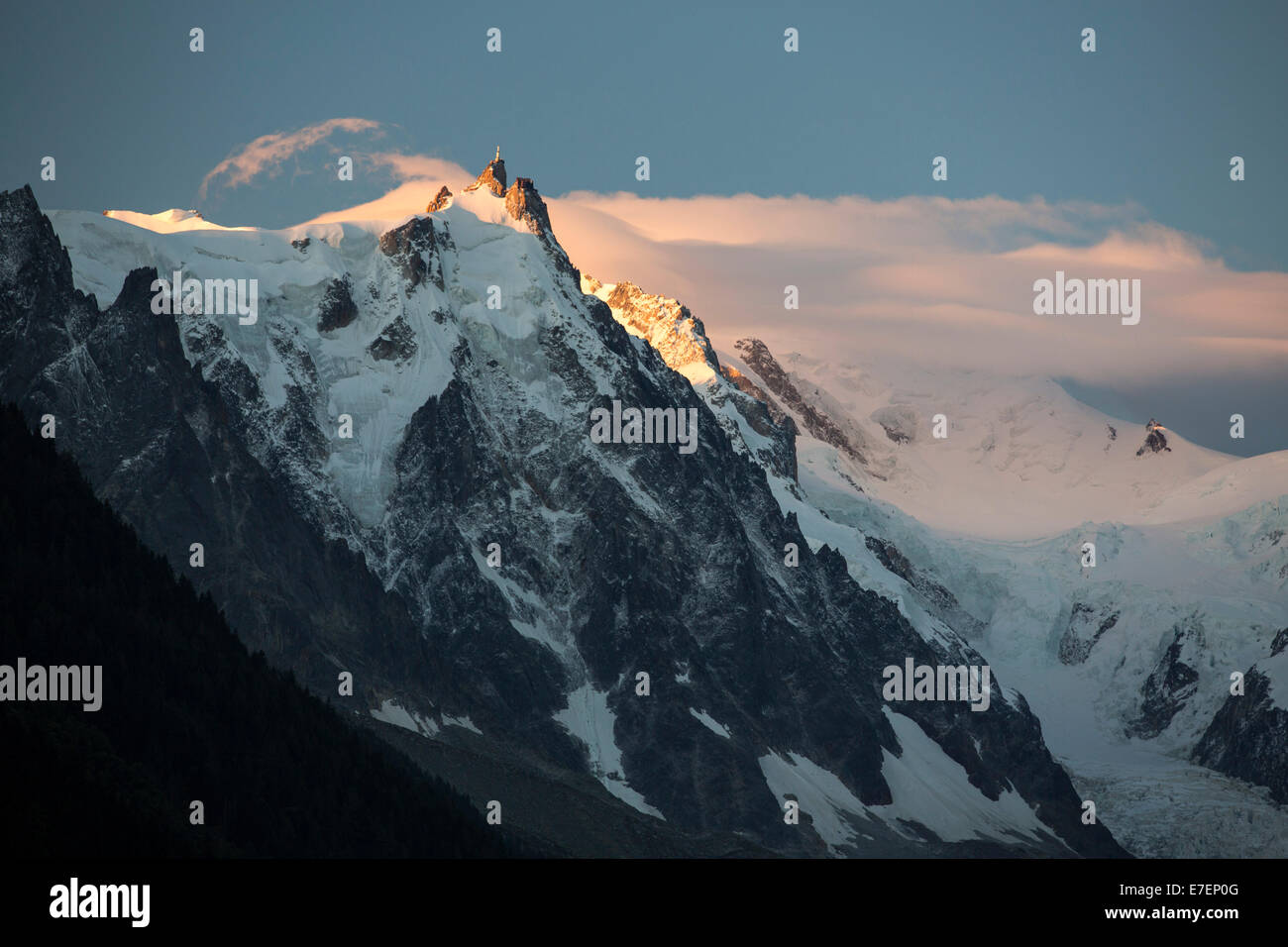 Dawn light on the Aiguille du midi in the Mont Blanc range above Chamonix, French Alps. Stock Photo