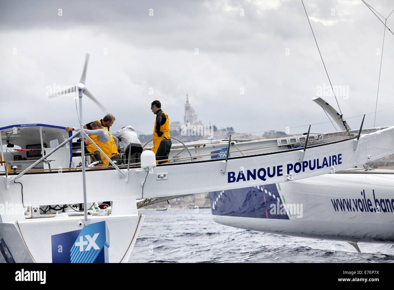 Armel Le Cléac?h and the Maxi Trimaran Solo Banque Populaire VII Trans at the start of the record attempt  Marseille ? Carthage. Stock Photo