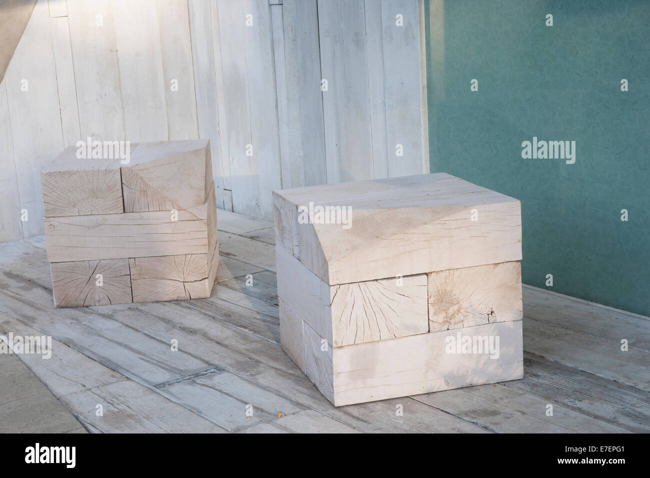 Garden - A Garden of Solitude - contemporary garden made from recycled and reused materials reclaimed oak seats Stock Photo