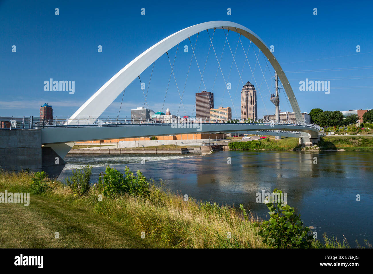 The Des Moines River Dam and downtown pedestrian bridge in Des Moines