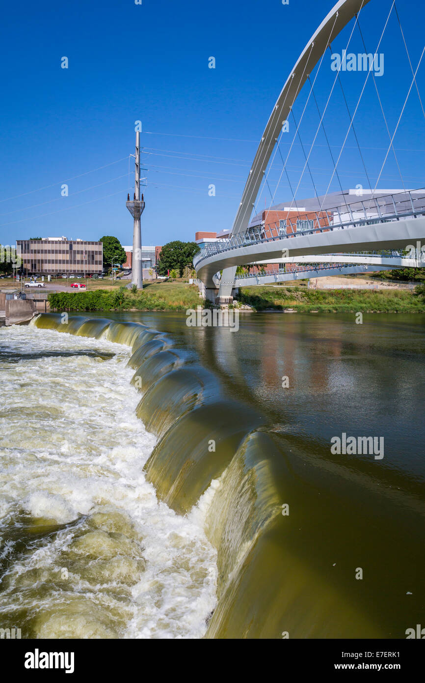 The Des Moines River Dam and downtown pedestrian bridge in Des Moines