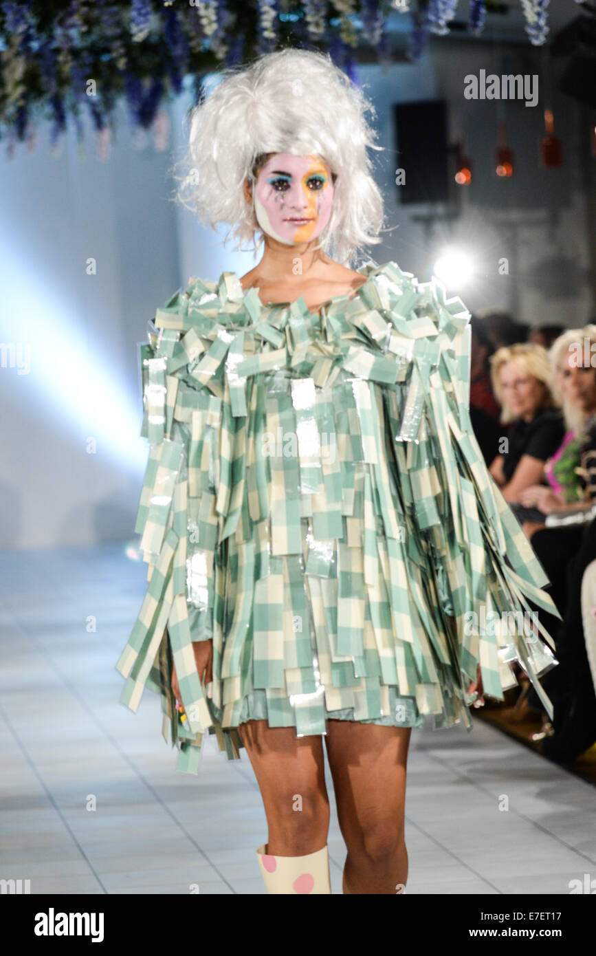 London, UK. 15th Sep, 2014. Vin and Omi showcased a striking new collection at London Fashion Week with their Spring/Summer 2015 designs during a catwalk event hosted at the Cumberland Hotel in Marble Arch. Photo by See Li//Alamy Live News Credit:  See Li/Alamy Live News Stock Photo