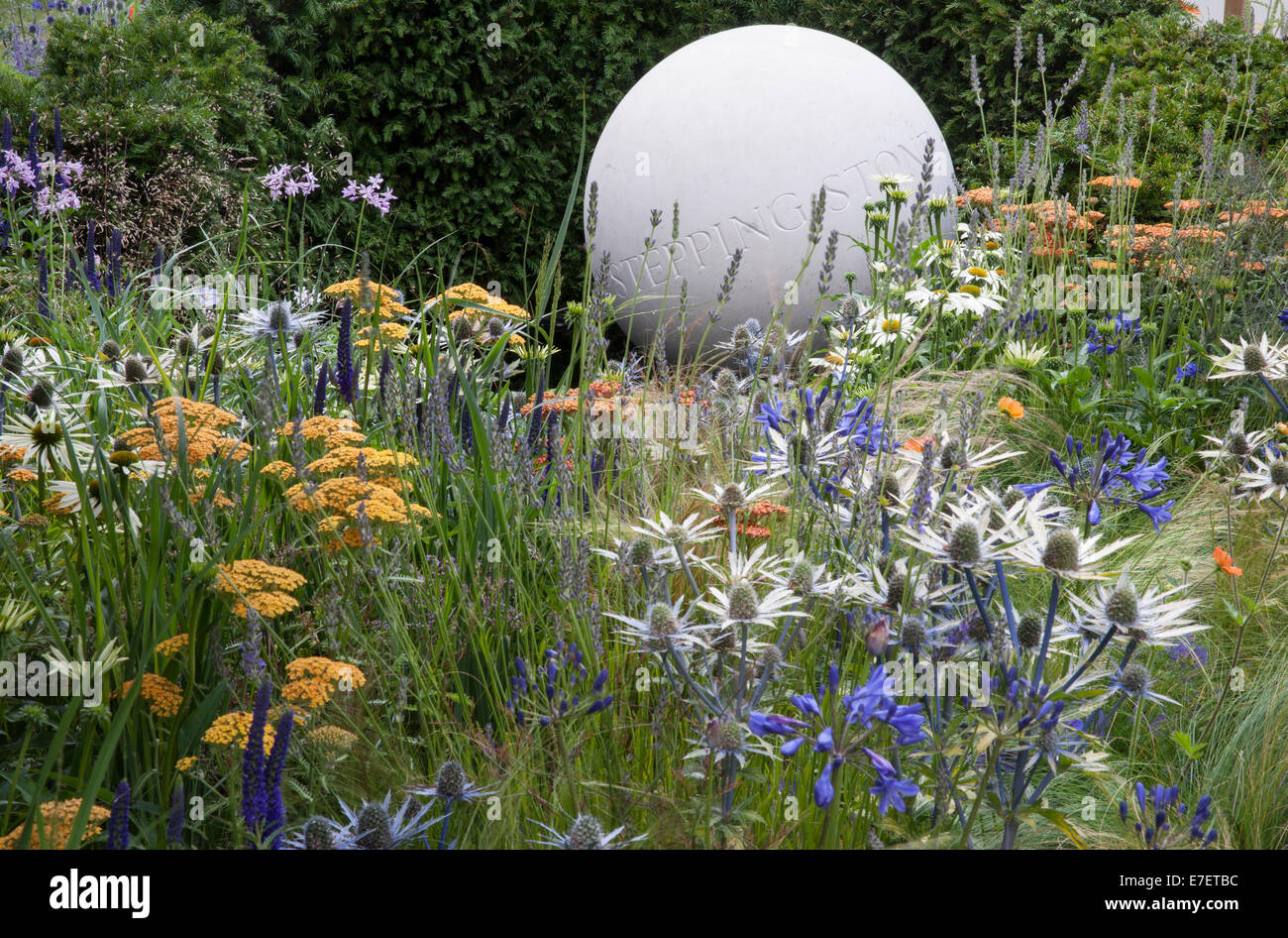 Garden - The Bounce Back Foundation Garden: Untying the Knot - view of garden with stone sculpture and planting Stock Photo