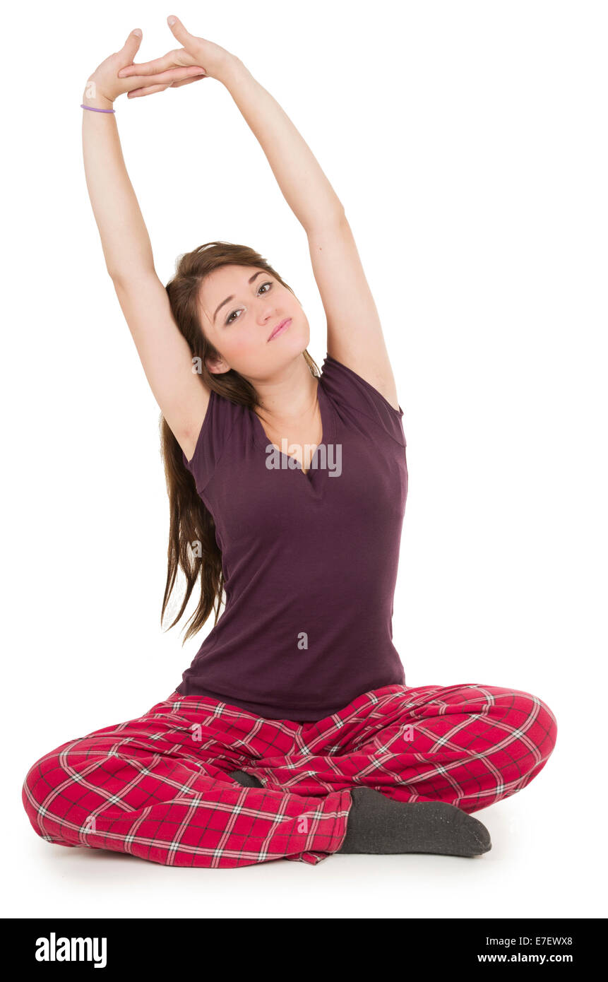 Pretty brunette teenage girl in pajamas pyjamas waking up Stock Photo -  Alamy