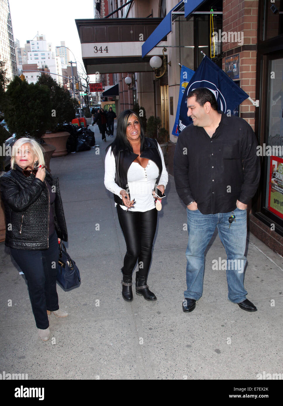 VH1 Mobwives Star Big Ang hosts the Bottomz Up Best New York City Bartender Contest at Bottomz Up Bar & Grill  Featuring: Sandy Wright,Big Ang Raiola,Eddie Fahmy Where: New York City, New York, United States When: 13 Mar 2014 Stock Photo