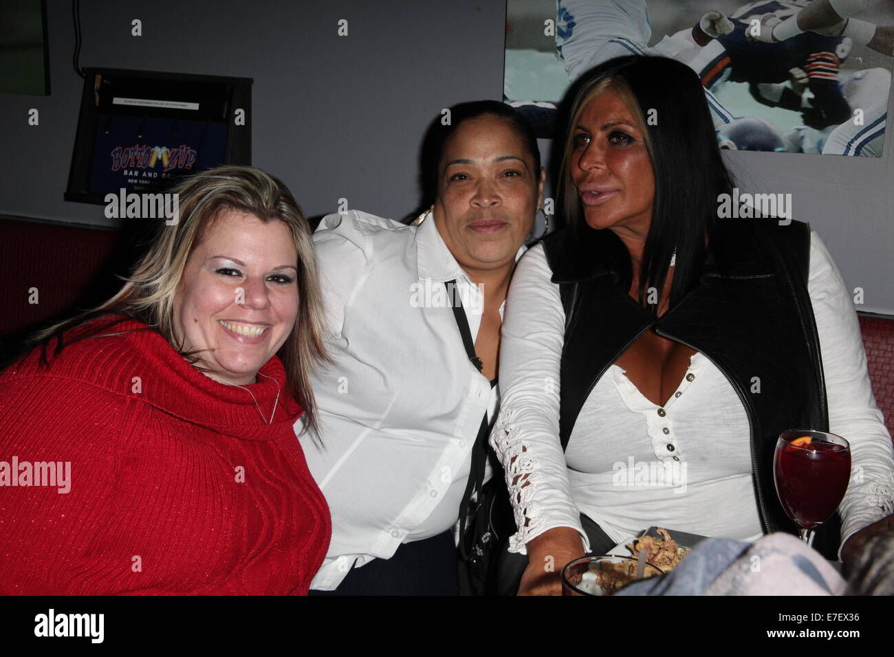 VH1 Mobwives Star Big Ang hosts the Bottomz Up Best New York City Bartender Contest at Bottomz Up Bar & Grill  Featuring: Corinne Brown,Yolanda Manfredy,Big Ang Raiola Where: New York City, New York, United States When: 13 Mar 2014 Stock Photo