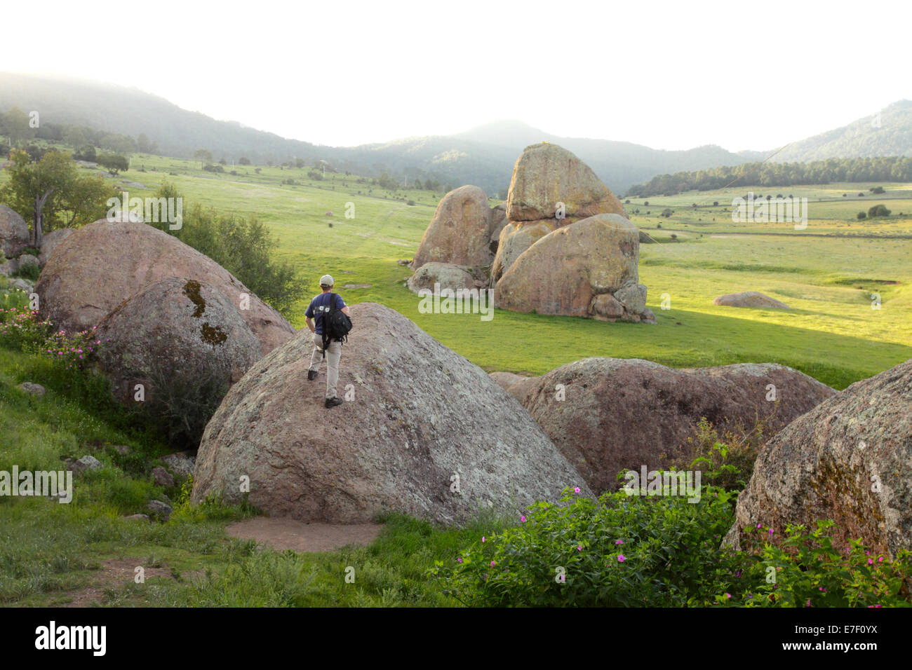 A tourist visits the Piedras Encimadas just outside of Tapalpa, Jalisco, Mexico. Stock Photo