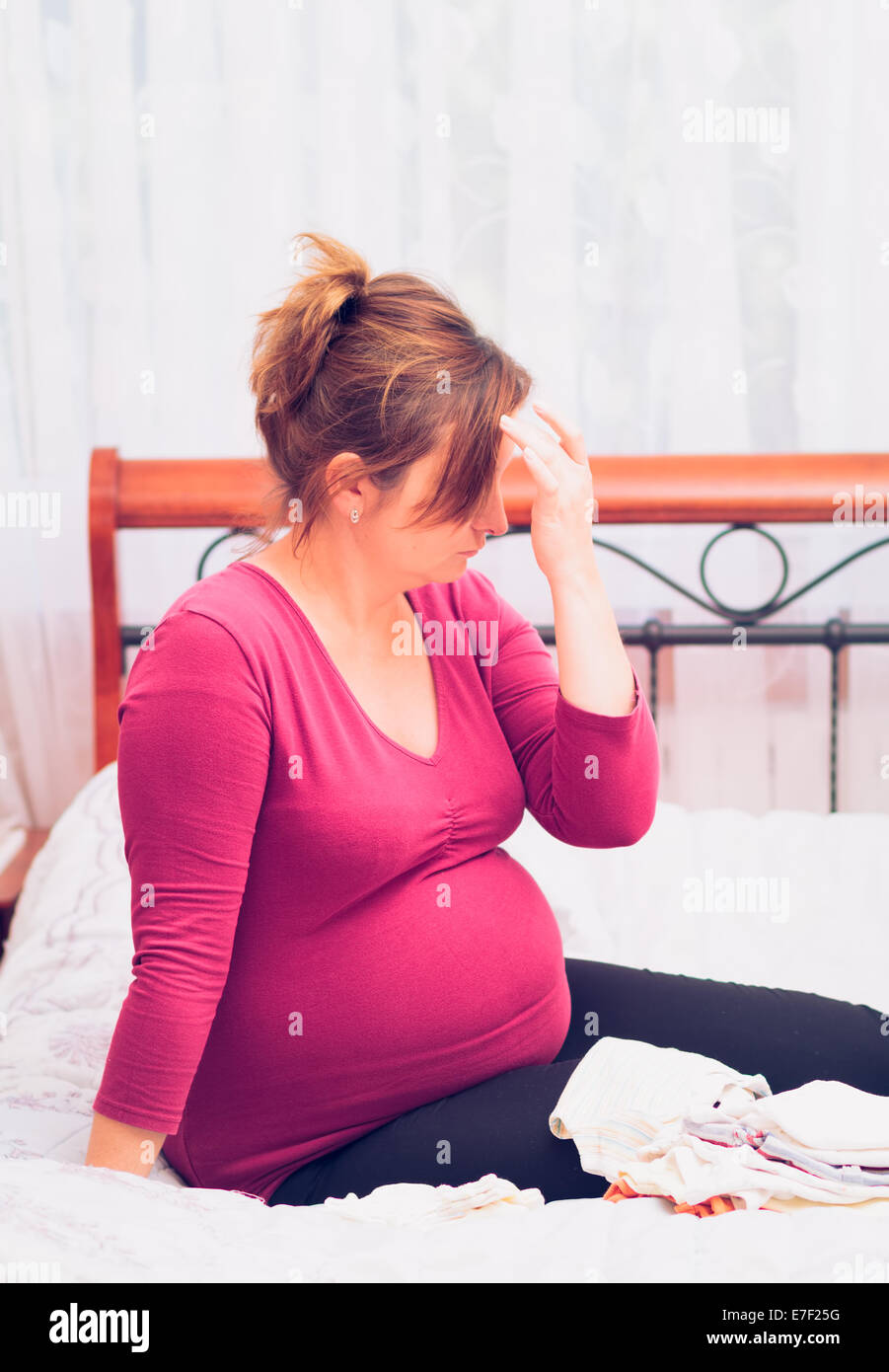 Pregnant woman packing hospital bag preparing for labor Stock Photo Alamy