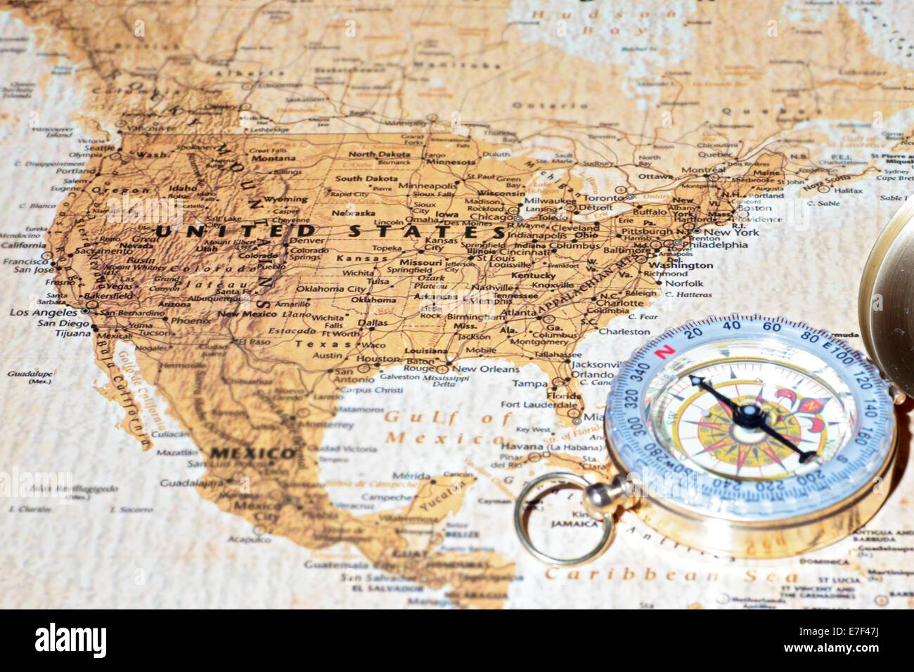 Compass on a map pointing at United States, planning a travel destination Stock Photo