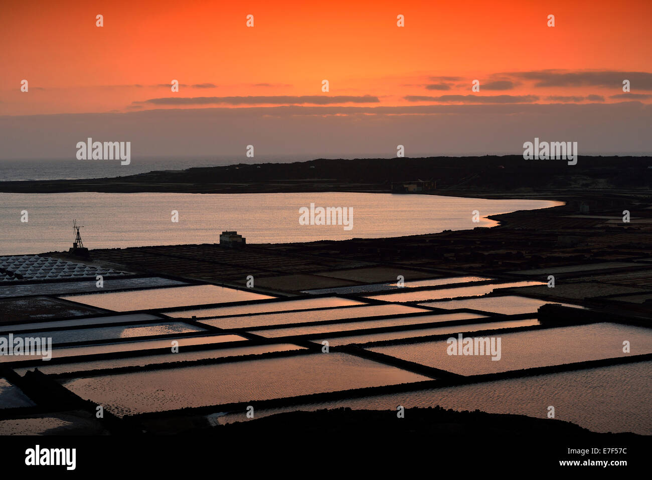Sea salt production, saltworks, Salinas de Janubio, sunset, Lanzarote, Canary Islands, Spain Stock Photo