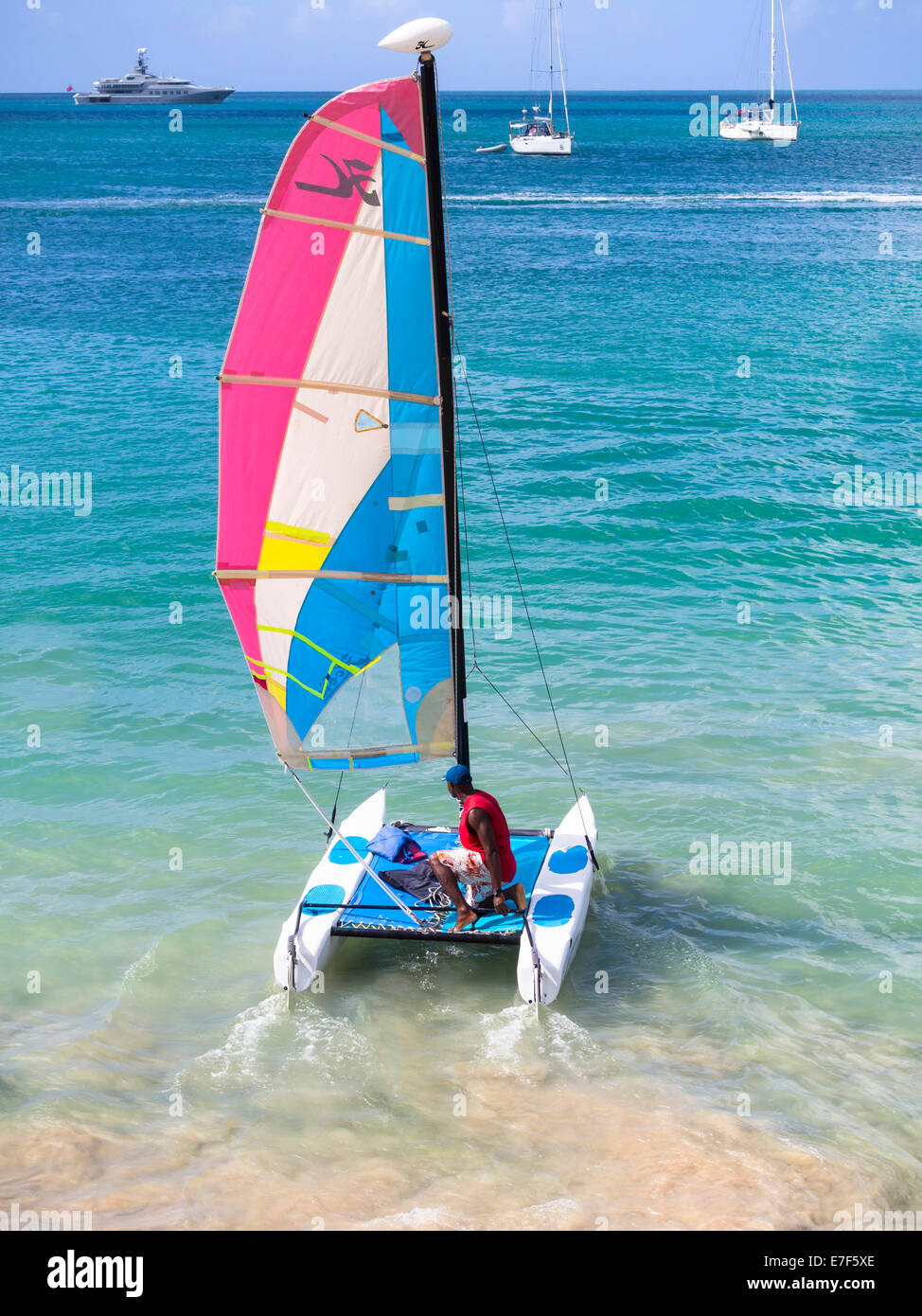 Catamaran leaving Rodney Bay, Saint Lucia, Windward Islands, Lesser Antilles Stock Photo