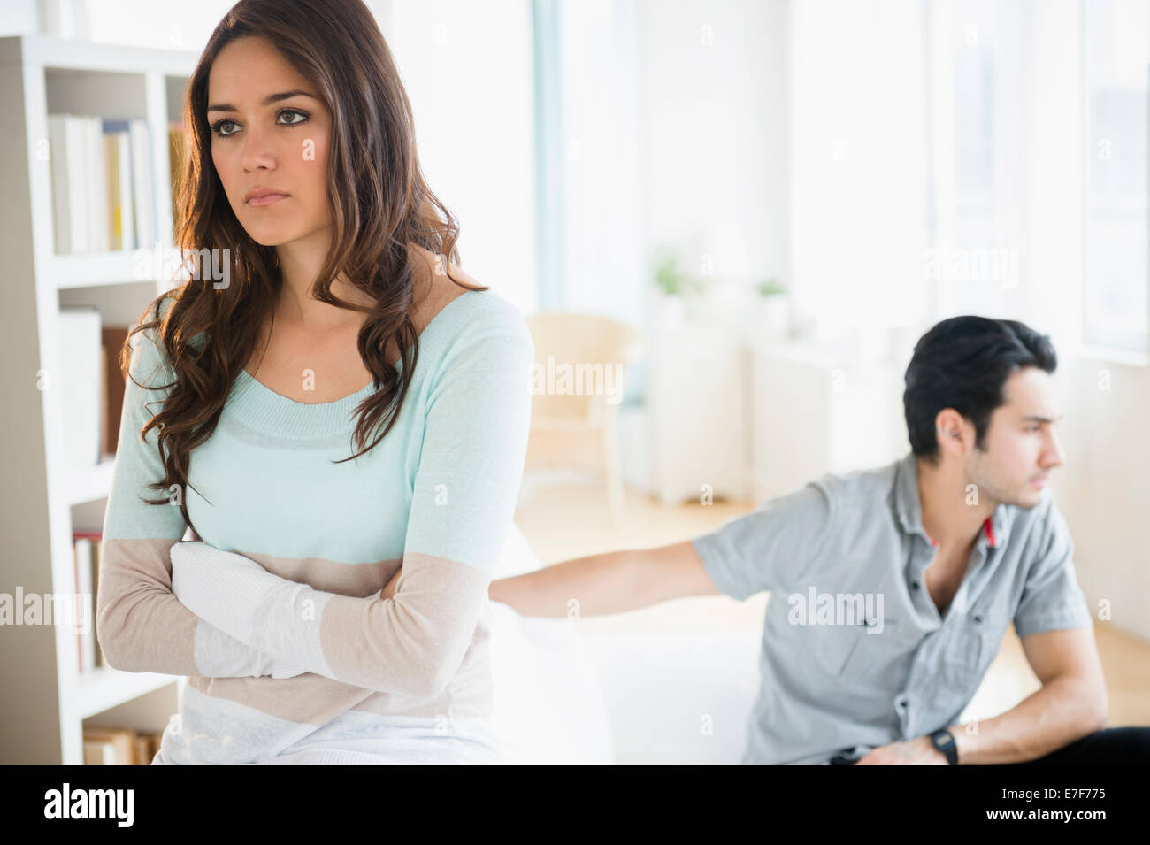 Couple arguing in living room Stock Photo